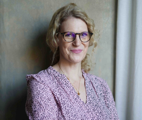 A professional headshot image of Anna McDougall
