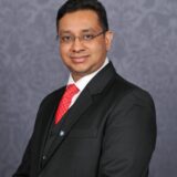 A professional headshot image of Dr Ritesh Kumar.